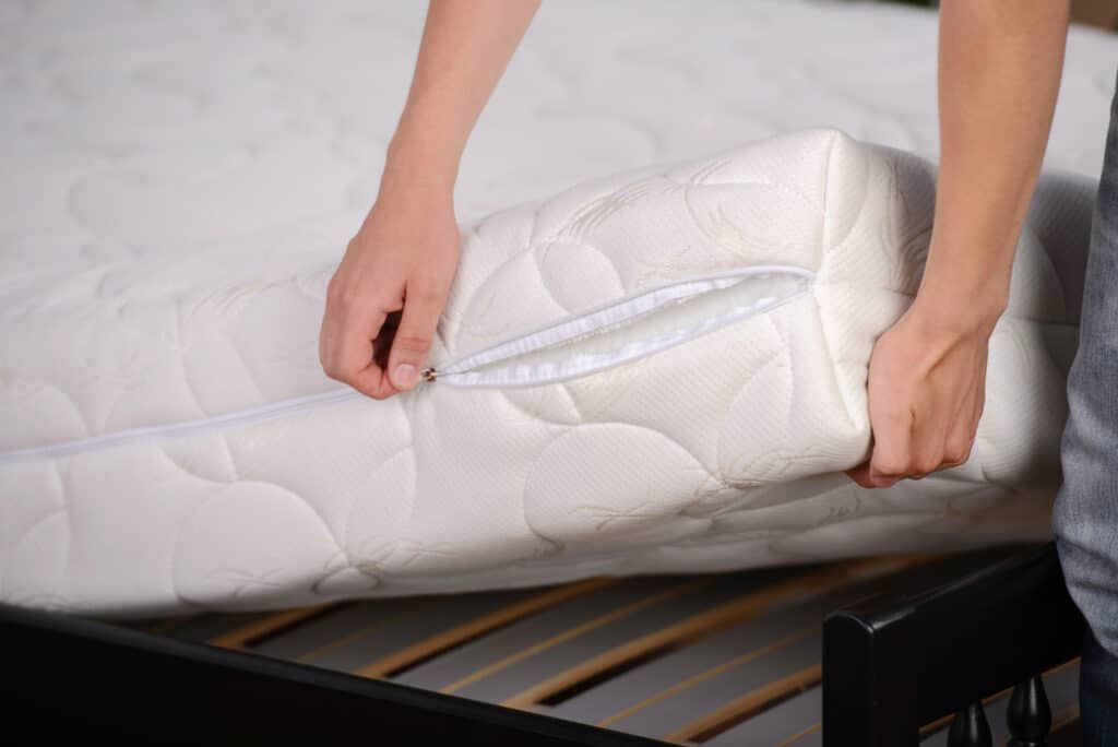 zipping a mattress cover