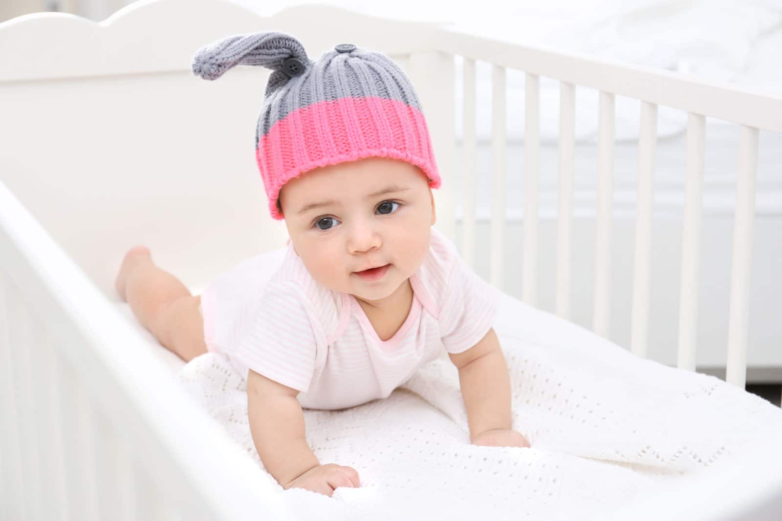 baby wearing a bonnet