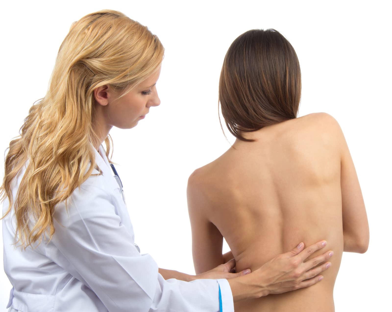 a doctor examining a patient with scoliosis