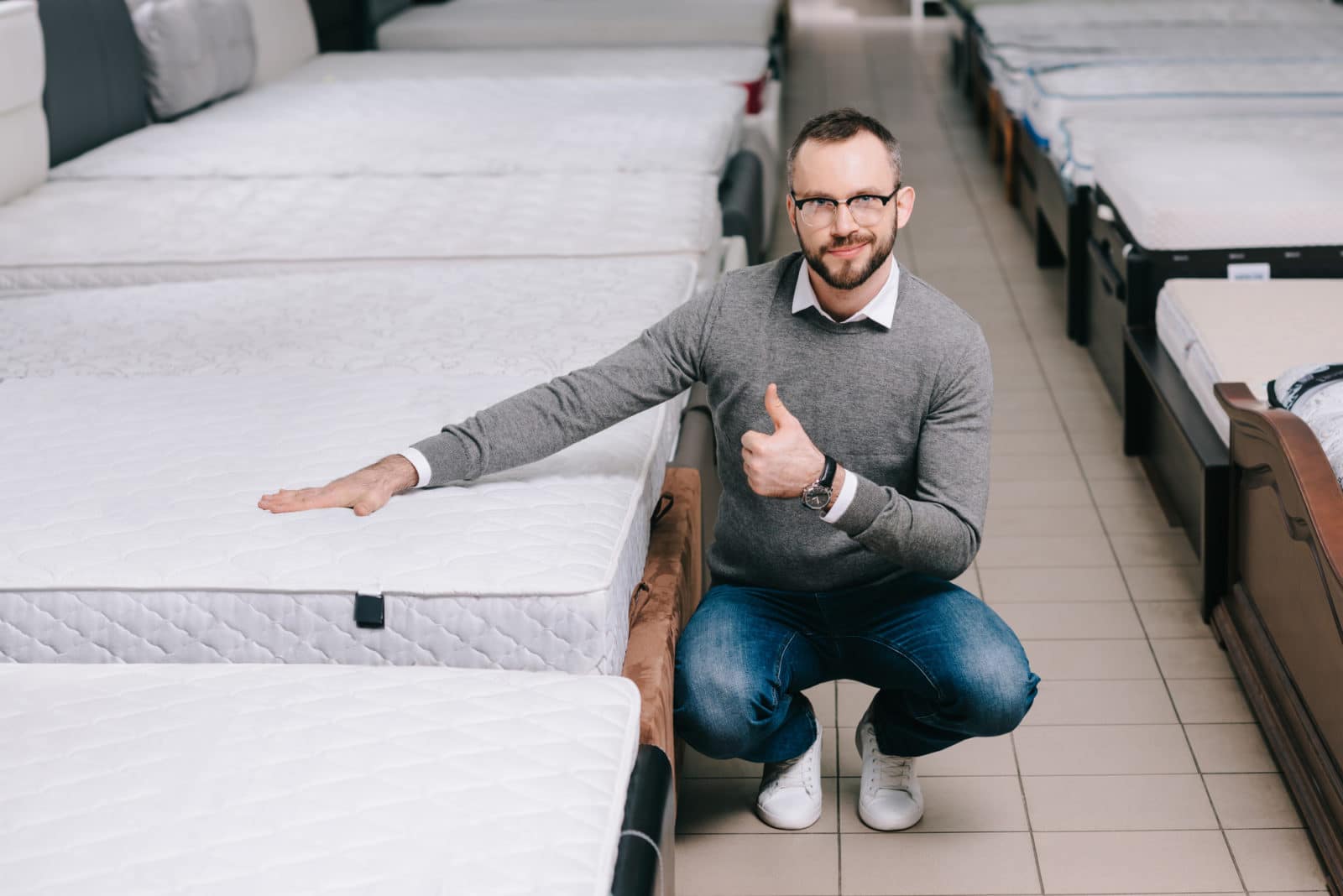 a man is happy with the bed he chose