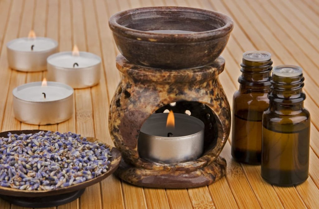 aromatherapy lamp with oil and dried lavender