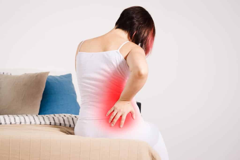 a lady with a back pain