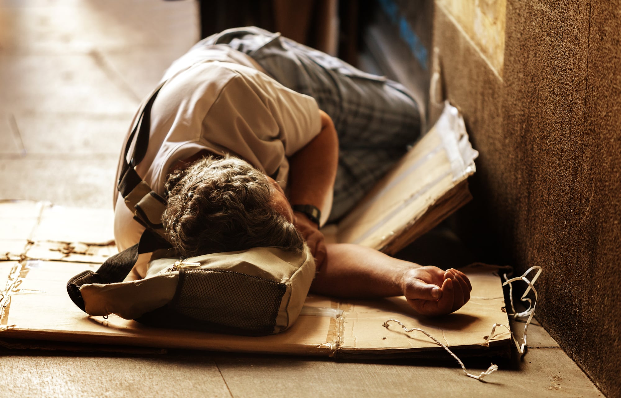 a man sleeping on the floor